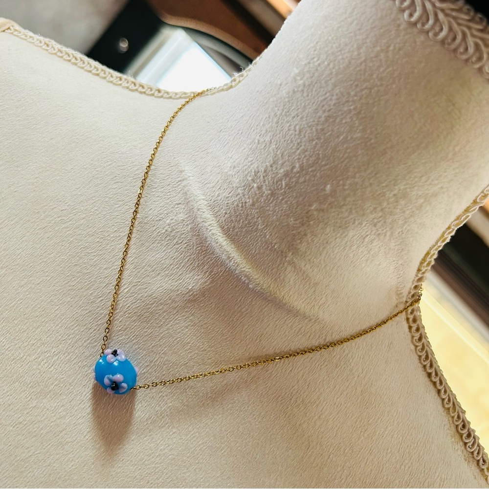 Handcrafted floral glass bead pendant on chain necklace
